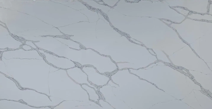 Marble surface with a light grey background and subtle dark veining.