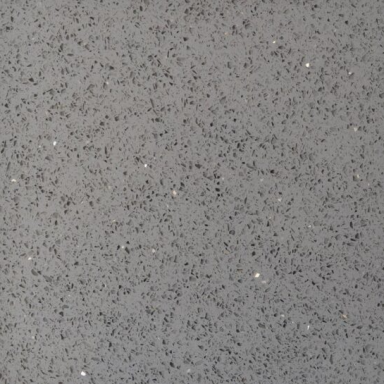 A light grey surface with fine speckles and a hint of sparkle.
